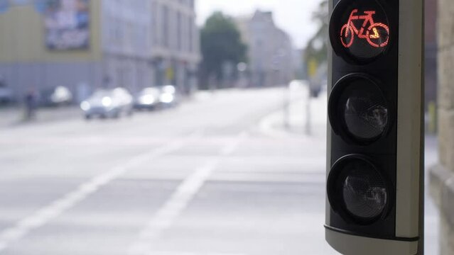 Changing the bicycle traffic light from red to green. City bicycle traffic