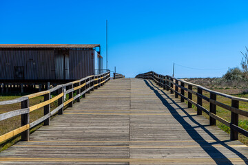 Wooden path to Manta Rota beach.  West Atlantic coast of Algarve region, south of Portugal.