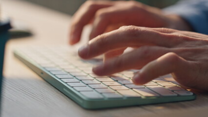 Man fingers texting keyboard working computer closeup. Freelancer hands typing