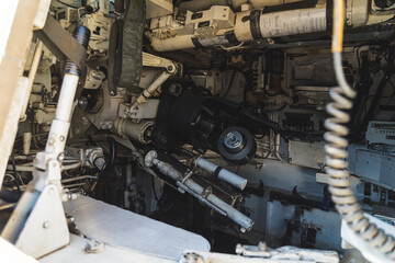 Inside view of a seat of soldier loading missiles. Monitors and promptings in an armoured troop-carrier tower. High quality photo