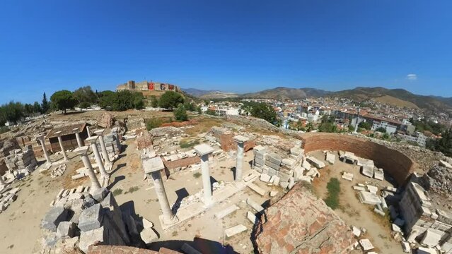 Kapija Progona Roman ruins in Selcuk, echoes past as tourists explore ancient shops, temples, and homes, revealing vibrant history of this once-thriving city. A captivating journey through time.