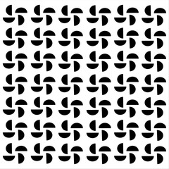 a black semi-circle image that is spun into a flower