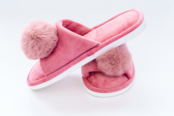 Cute home pink fluffy slippers on white background