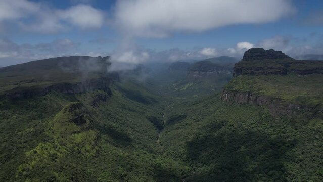 Drone video of Vale do Pati in Chapada Diamantina, Bahia, Brazil. Valley with cerrado and caatinga biome, sunny day, abundant nature, hills and valley