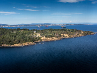 Freighters anchored off the Southern tip of Vancouver Island overlooking downtown Victoria British Columbia.