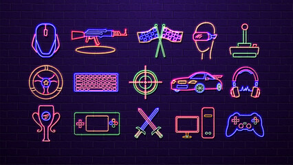 A set of neon icons for cyber sports, virtual reality, computer and console games on a brick wall background. © Dmytro