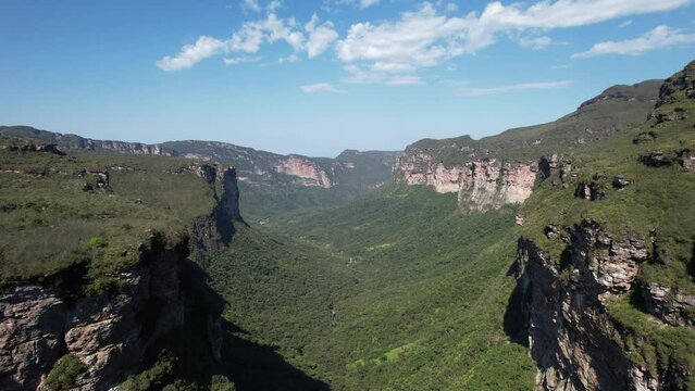 Drone view of the Cachoeir&atilde;o viewpoint in Vale do Pati in Chapada Diamantina, Bahia, Brazil. Valley with cerrado and caatinga biome, sunny day, abundant nature, hills, valley and canyon
