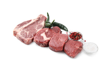 Cut fresh beef meat with spices isolated on white