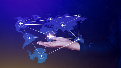 Businessman hand pushing flight booking networking, Hand pressing light blue world map with flight routes airplane, Transportation concept.