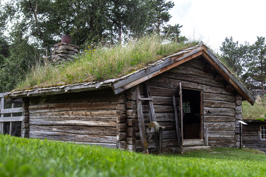 Traditional wooden houses with roof covered with grass and plants in Norway, Scandinavia