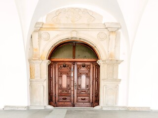 Beautiful old door in a stone house in the old town of Krosno, Poland. - obrazy, fototapety, plakaty