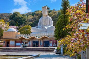 Kyoto, Japan - March 30 2023: Ryozen Kannon Temple is a war memorial dedicated to the fallen both sides of the Pacific War.The 24-meter statue of the Goddess of Mercy was built in 1955