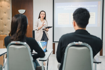 University College instructors and advisors meet female college students to advise their research study. University in classroom campus, college professor teacher and asian students discuss, teamwork 
