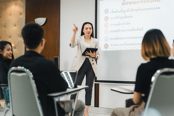 University College instructors and advisors meet female college students to advise their research study. University in classroom campus, college professor teacher and asian students discuss, teamwork  - obrazy, fototapety, plakaty
