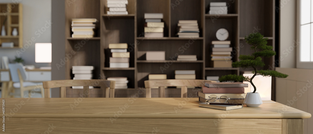 Aufkleber copy space on a wooden tabletop with a blurred large bookshelf in the background.