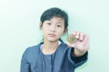 cute Thai girl happily with  Cryptocurrency 