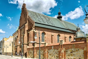 Monastery of Fr. The Franciscans with the Church of the Blessed Virgin Mary are located in Krosno at st. Franciskanska, near the market square. - obrazy, fototapety, plakaty