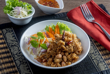 Crisp Catfish Flake Salad on the wooden table