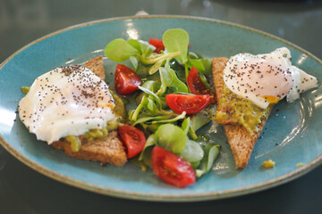 Tasty fresh toast with avocado and egg