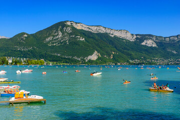 People having fun on Lake Annecy, Europe's cleanest lake, in Haute-Savoie department, France