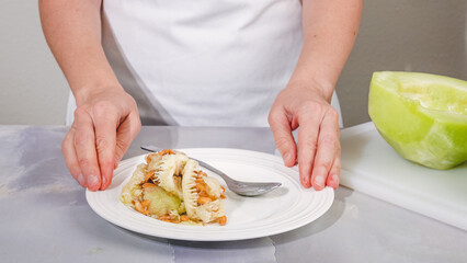 Honeydew melon close up on cutting board. How to peel and seed melon, close up process
