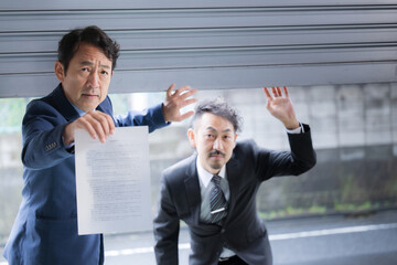 Image like a detective with a tax investigation or arrest warrant.