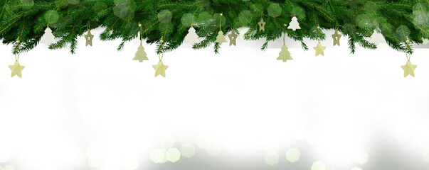 Wooden Christmas and new year toys on Christmas tree branches , top view, copy space, banner, holiday mood.