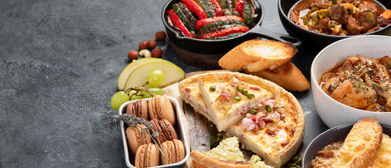Traditional french food -mussel and meat dishes, ratatouille, snails, croissants, desserts, fresh pastries and cheese.