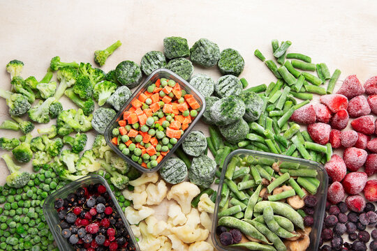 A set of foods for the winter. Various of frozen vegetables and berries