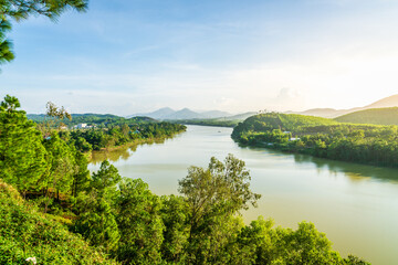 Fototapeta na wymiar Scenic view of the Perfume River and surrounding landscape in Hue, Vietnam
