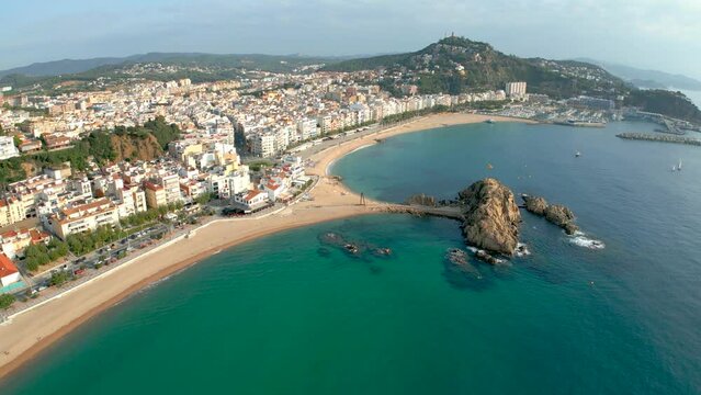 Aerial view with Drone of the city of Blanes, main square, turquoise blue water, Costa Brava, Lloret De Mar and Tossa de Mar