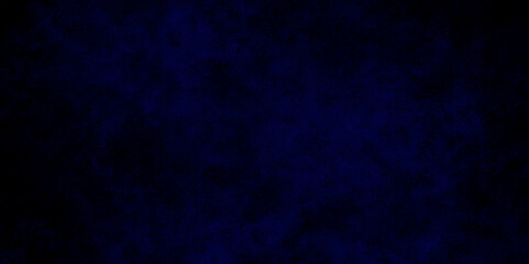 Vivid textured aquarelle painted Blue background with clouds, dark blue grunge texture with grainy, Light ink canvas for modern creative grunge design. Watercolor on deep dark blue paper background.