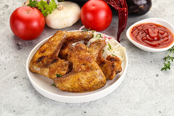 Grilled chicken wings with sauce