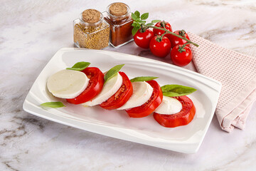 Italian caprese salad with mozzarella