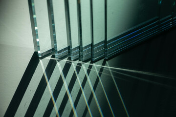 Light rays pass through glass colorful background