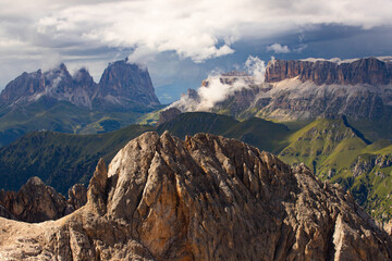 The view of Sassolungo and the Sella Group from Serauta in the Dolomites, Italy.