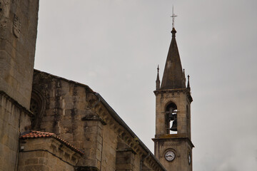 Detail of the bell tower of the church of Santiago in Gothic style. Concept architecture, churches, religion, bells, gothic, medieval.