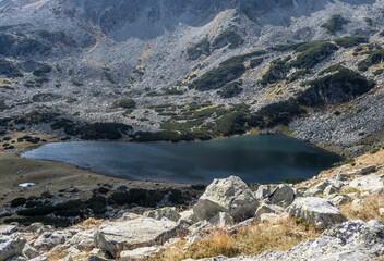 View of Bucura lake in National Park Retezat, Romania. This is the glacial lake with the largest surface in Romania.