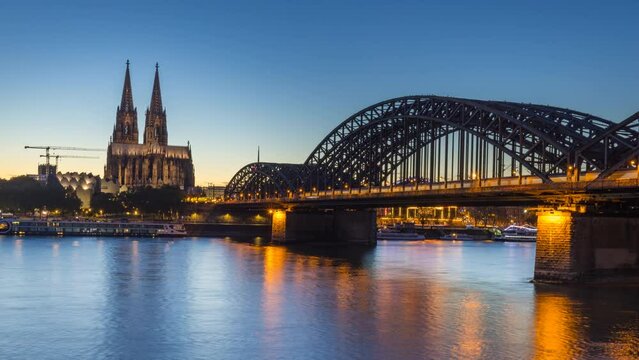 Cologne night skyline aerial view time lapse footage of city cologne germany view of cologne cathedral dome bridge and river.