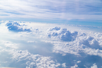 Fototapeta na wymiar The Cloud and blue sky from the airplane windows