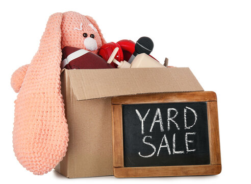 Box Of Unwanted Stuff For Yard Sale Isolated On White Background