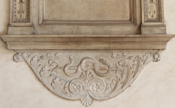 Sculpted Detail with a Snake at the San Marco Basilica Portico in Rome, Italy
