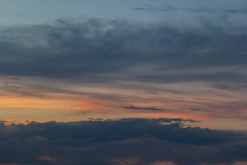 sunset sky with multicolor clouds. Dramatic twilight sky background