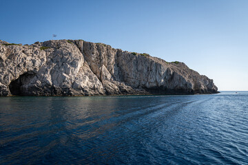 Majestic Rock Formations of Rhodes: A sea-level view of the stunning cliffs and geological wonders...