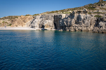 Fototapeta na wymiar Stunning Beach and Rock Formations of Rhodes: A sea-level panoramic view of the island's diverse coastline, showcasing sandy retreats and towering cliffs, epitomizing Grecian beauty.