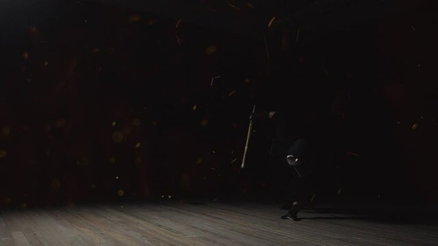 Man In Kendo Equipment Performing Kendo Stunts