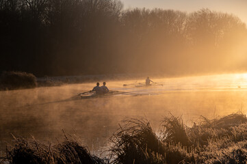 rowing in mist on the river