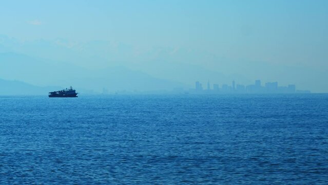 Fishing Boat Trawler Ship Sailing On Sea. Fishing Boat Sailed From The Coast. Real time.