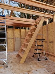 Retractable stair case for a tiny home to second-floor living area