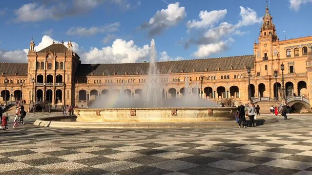 Hyper lapse of Plaza de Espana in Seville, Spain. Revealing semi-circular architecture building, surrounded by iconic square with a majestic fountain.